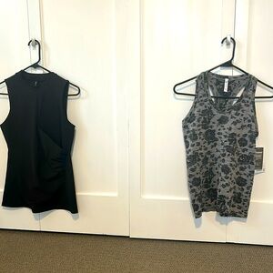 TWO Athleta tank tops size small.